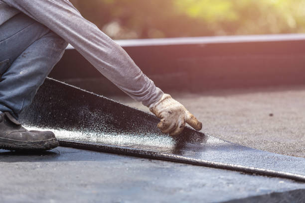 Professional Emergency Waterproofing technician working in Petersburg, VA
